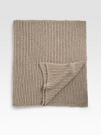 A nubby bouclé knit crafted with comfort in mind from remarkably soft and luxurious cashmere. 56 X 72 Cashmere; dry clean Imported 