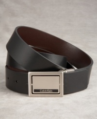 Reversible from brown to black, this smooth leather belt is a true multi-tasker. The silver plaque buckle gives it a distinctly modern edge, and flips to offer a whole different look. Reversible from brown to black, this smooth leather belt is a true multi-tasker. The silver plaque buckle gives it a distinctly modern edge, and flips to offer a whole different look.