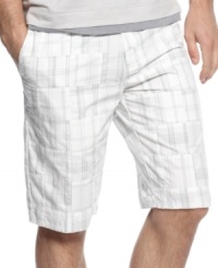 Subdued tones elevate these plaid shorts from Calvin Klein. The perfect pair for a more refined summer look. Subdued tones elevate these plaid shorts from Calvin Klein. The perfect pair for a more refined summer look.