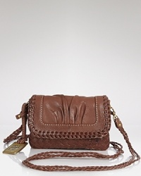 Compact style goes rugged with this Western-inspired crossbody bag from Frye. In rich leather with braided detailing, it's a perfect partner for pared down denim. Compact style goes rugged with this Western-inspired crossbody bag from Frye. In rich leather with braided detailing, it's a perfect partner for pared down denim.