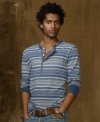 A striped jacquard Henley epitomizes a downtown bohemian vibe in a slouchy cotton style.