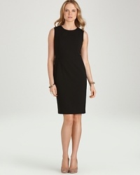 Always classic, forever chic: this Calvin Klein sheath dress is a seasonal staple perfect for pairing with chunky cardigans and shimmering accessories. Always classic, forever chic: this Calvin Klein sheath dress is a seasonal staple perfect for pairing with chunky cardigans and shimmering accessories.
