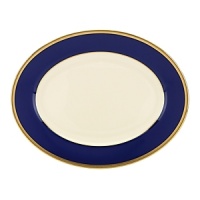 Inspired by privately commissioned presidential dinnerware, this fine china features stately navy bands and a gold border etched with patriotic stars. Inspired by privately commissioned presidential dinnerware, this fine china features stately navy bands and a gold border etched with patriotic stars.