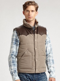 A puffer vest featuring exquisite leather details and an iconic True Religion stitching below front yoke.Stand collarSnap frontPatch pocketsNylon; leather front and back yoke Dry clean by leather specialistImported A puffer vest featuring exquisite leather details and an iconic True Religion stitching below front yoke.Stand collarSnap frontPatch pocketsNylon; leather front and back yoke Dry clean by leather specialistImported