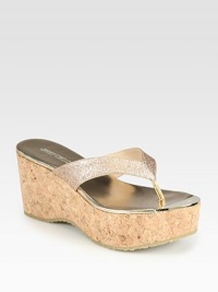 A textured cork wedge heightens this glittery staple with reflective metallic leather accents. Cork wedge, 2¾ (70mm)Cork platform, 1½ (40mm)Compares to a 1¼ heel (30mm)Glitter-coated leather upper with metallic leather trimLeather liningRubber solePadded insoleMade in Spain A textured cork wedge heightens this glittery staple with reflective metallic leather accents. Cork wedge, 2¾ (70mm)Cork platform, 1½ (40mm)Compares to a 1¼ heel (30mm)Glitter-coated leather upper with metallic leather trimLeather liningRubber solePadded insoleMade in Spain