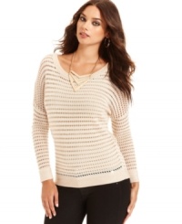 A hot layering piece for fall, this GUESS metallic open-stitch sweater adds shimmer & shine to any casual look! A hot layering piece for fall, this GUESS metallic open-stitch sweater adds shimmer & shine to any casual look!