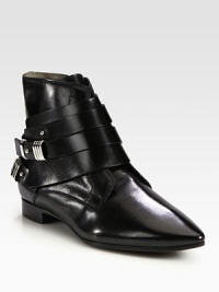 Must-have leather ankle boot with a classic point toe and edgy metal hardware. Leather upperPoint toeSide zip and straps with metal pull-tab closuresLeather lining and solePadded insoleMade in Italy Must-have leather ankle boot with a classic point toe and edgy metal hardware. Leather upperPoint toeSide zip and straps with metal pull-tab closuresLeather lining and solePadded insoleMade in Italy