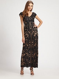 A striking column silhouette embellished with floral corded ribbon embroidery and subtle sequins for just a hint of sparkle.V-neckCap sleevesConcealed side zip closureAllover corded ribbon embroideryBack slitScalloped hemAbout 44 from natural waistFully linedNylonDry cleanImportedModel shown is 5'10 (177cm) wearing US size 4.This style runs true to size. We recommend ordering your usual size for a standard fit. A striking column silhouette embellished with floral corded ribbon embroidery and subtle sequins for just a hint of sparkle.V-neckCap sleevesConcealed side zip closureAllover corded ribbon embroideryBack slitScalloped hemAbout 44 from natural waistFully linedNylonDry cleanImportedModel shown is 5'10 (177cm) wearing US size 4.This style runs true to size. We recommend ordering your usual size for a standard fit.