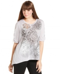 Lend pizzazz to your weekend look with Style&co.'s printed plus size top, finished by a high-low hem. Lend pizzazz to your weekend look with Style&co.'s printed plus size top, finished by a high-low hem.