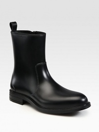 Sleek, racy motocross boots in manmade leather make quite a splash on rainy days.Leather liningPadded insoleRubber soleMade in Italy Sleek, racy motocross boots in manmade leather make quite a splash on rainy days.Leather liningPadded insoleRubber soleMade in Italy