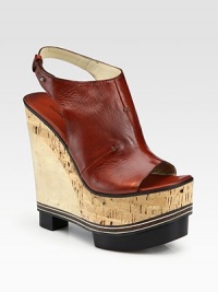 Elevated by a cork and wooden wedge, this slip-on leather mule has a uniquely crafted platform and an adjustable slingback strap. Cork and wooden heel, 6 (150mm)Cork and wooden platform, 2½ (65mm)Compares to a 3½ heel (90mm)Leather upperLeather lining and solePadded insoleMade in ItalyOUR FIT MODEL RECOMMENDS ordering one size up as this style runs small. Elevated by a cork and wooden wedge, this slip-on leather mule has a uniquely crafted platform and an adjustable slingback strap. Cork and wooden heel, 6 (150mm)Cork and wooden platform, 2½ (65mm)Compares to a 3½ heel (90mm)Leather upperLeather lining and solePadded insoleMade in ItalyOUR FIT MODEL RECOMMENDS ordering one size up as this style runs small.