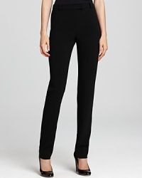 Staple black Armani Collezioni pants are the effortlessly chic update to your perennial office collection that you crave from nine to five. Staple black Armani Collezioni pants are the effortlessly chic update to your perennial office collection that you crave from nine to five.