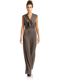 THE LOOKTie neckV-neckSeamed waistDual seam pocketsKeyhole back button closureBack zipperTHE FITRise, about 13Inseam, about 34THE MATERIALPolyesterCARE & ORIGINDry cleanImportedModel shown is 5'8 (172½cm) wearing US size Small. THE LOOKTie neckV-neckSeamed waistDual seam pocketsKeyhole back button closureBack zipperTHE FITRise, about 13Inseam, about 34THE MATERIALPolyesterCARE & ORIGINDry cleanImportedModel shown is 5'8 (172½cm) wearing US size Small.