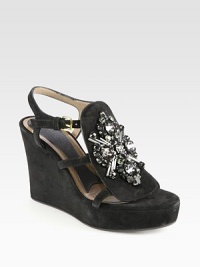 Make a grand entrance wearing this wedge sandal in rich suede, ornamented with elaborate rhinestones. Self-covered wedge, 4 (100mm)Suede upper with glass beads and rhinestonesAdjustable ankle strapLeather liningRubber solePadded insoleMade in Italy Make a grand entrance wearing this wedge sandal in rich suede, ornamented with elaborate rhinestones. Self-covered wedge, 4 (100mm)Suede upper with glass beads and rhinestonesAdjustable ankle strapLeather liningRubber solePadded insoleMade in Italy