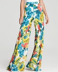 Spring's floral trend abounds on these Alice + Olivia pants, rendered in an exaggerated, wide-leg silhouette for statement-making style at its finest. Keep all eyes on this prize and partner the look with a simple silk blouse. Spring's floral trend abounds on these Alice + Olivia pants, rendered in an exaggerated, wide-leg silhouette for statement-making style at its finest. Keep all eyes on this prize and partner the look with a simple silk blouse.