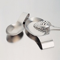 This stainless steel spoon rest holds your cooking utensils and keeps your stovetop clean and protected from stains. Brushed finish. Dishwasher safe. This stainless steel spoon rest holds your cooking utensils and keeps your stovetop clean and protected from stains. Brushed finish. Dishwasher safe.