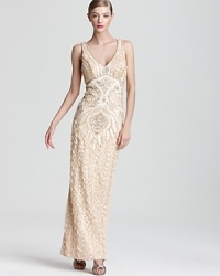 Opt for opulent glamour in this Sue Wong gown, boasting elegant embroidery and sparkling beading from shoulder to hem.