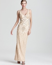 Opt for opulent glamour in this Sue Wong gown, boasting elegant embroidery and sparkling beading from shoulder to hem. Opt for opulent glamour in this Sue Wong gown, boasting elegant embroidery and sparkling beading from shoulder to hem.