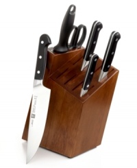 Crafted for comfort, ease and precision results, the unique blade and ergonomic bolster designs of this cutlery set make it easy to prep like a pro. An innovative blade shape offers full edge utility and reduces stress on your wrist, while the unbeatable Zwilling special formula steel construction guarantees year after year of exceptional use. Lifetime warranty. Crafted for comfort, ease and precision results, the unique blade and ergonomic bolster designs of this cutlery set make it easy to prep like a pro. An innovative blade shape offers full edge utility and reduces stress on your wrist, while the unbeatable Zwilling special formula steel construction guarantees year after year of exceptional use. Lifetime warranty.