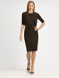 Finespun merino wool in a classic bolero silhouette, for the perfect layering piece.Open frontElbow-length sleevesAbout 15 from shoulder to hemMerino woolDry cleanImported of Italian fabricModel shown is 5'10½ (179cm) wearing US size Small. Finespun merino wool in a classic bolero silhouette, for the perfect layering piece.Open frontElbow-length sleevesAbout 15 from shoulder to hemMerino woolDry cleanImported of Italian fabricModel shown is 5'10½ (179cm) wearing US size Small.