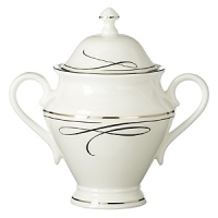 Waterford's Ballet Ribbon bone china dinnerware echoes the graceful forms and lines of the interpretive dance and the satin ribbons which adorn ballerinas' costumes and pointe shoes. Mix in the brightly colored accent plates to make your table pop or to blend the pattern into your dining décor. Waterford's Ballet Ribbon bone china dinnerware echoes the graceful forms and lines of the interpretive dance and the satin ribbons which adorn ballerinas' costumes and pointe shoes. Mix in the brightly colored accent plates to make your table pop or to blend the pattern into your dining décor.
