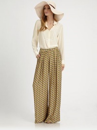 High-waisted and oh-so-sophisticated, these wide-leg silk pants boast an intricate geometric pattern and gently-pleated silhouette.High tab-front waistPleating at waistlineZip-flySlash pocketsRise, about 11Inseam, about 34SilkDry cleanImportedModel shown is 5'10 (178cm) wearing US size 4. High-waisted and oh-so-sophisticated, these wide-leg silk pants boast an intricate geometric pattern and gently-pleated silhouette.High tab-front waistPleating at waistlineZip-flySlash pocketsRise, about 11Inseam, about 34SilkDry cleanImportedModel shown is 5'10 (178cm) wearing US size 4.