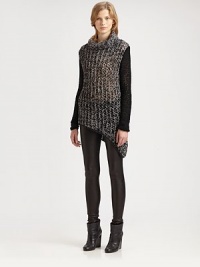 An asymmetrical hem adds modern style to this chunky knit with a cozy funnelneck. FunnelneckDropped shouldersLong sleevesAsymmetrical hemAbout 35 from shoulder to hem80% wool/20% nylonDry cleanImported of Italian fabricModel shown is 5'10 (177cm) wearing US size Small. An asymmetrical hem adds modern style to this chunky knit with a cozy funnelneck. FunnelneckDropped shouldersLong sleevesAsymmetrical hemAbout 35 from shoulder to hem80% wool/20% nylonDry cleanImported of Italian fabricModel shown is 5'10 (177cm) wearing US size Small.