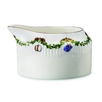 With its elegant depictions of pine garlands, red ribbons and traditional Christmas ornaments, Royal Copenhagen's fine bone-china serveware is the perfect backdrop to a joyous holiday celebration. A well-loved classic, the Star Fluted design was first produced in 1895. With its elegant depictions of pine garlands, red ribbons and traditional Christmas ornaments, Royal Copenhagen's fine bone-china serveware is the perfect backdrop to a joyous holiday celebration. A well-loved classic, the Star Fluted design was first produced in 1895.