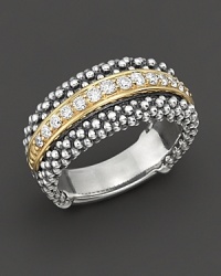 Lagos' Caviar ring blends a polished gold plate band with crystal accents over a bundled band of sterling silver beads. Designed by Lagos. Lagos' Caviar ring blends a polished gold plate band with crystal accents over a bundled band of sterling silver beads. Designed by Lagos.