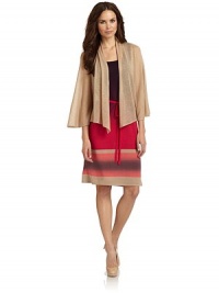 THE LOOKShawl collarDolman sleevesTHE FITAbout 20 from shoulder to hemTHE MATERIAL55% silk/45% cashmereCARE & ORIGINDry cleanImportedModel shown is 5'11 (180cm) wearing US size Small. THE LOOKShawl collarDolman sleevesTHE FITAbout 20 from shoulder to hemTHE MATERIAL55% silk/45% cashmereCARE & ORIGINDry cleanImportedModel shown is 5'11 (180cm) wearing US size Small.