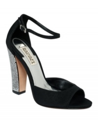 Light up the night with the Wynter evening sandals by Badgley Mischka. Rhinestone embellishments make the chunky heel an instant eye-catcher. Light up the night with the Wynter evening sandals by Badgley Mischka. Rhinestone embellishments make the chunky heel an instant eye-catcher.