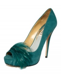 Light as a feather. Spend the evening floating on air with the Ginnie platform pumps by Badgley Mischka, featuring a sultry suede silhouette with sky-high heel and saucy feather embellishment. Light as a feather. Spend the evening floating on air with the Ginnie platform pumps by Badgley Mischka, featuring a sultry suede silhouette with sky-high heel and saucy feather embellishment.