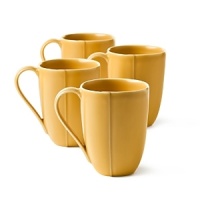 Borrowing from nature, these porcelain mugs have a highly glossed surface and unusual contours, creating an interesting silhouette - a DVF signature - on the table. Borrowing from nature, these porcelain mugs have a highly glossed surface and unusual contours, creating an interesting silhouette - a DVF signature - on the table.
