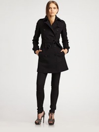 Double-breasted, wool/cashmere design is finished with the details that make it a classic.Shoulder epaulettes Hook closure at collar Button front Shoulder and back button flaps Side buttoned pockets Self belt with buckle Belt and buckle tabs on cuffs D-ring trim on belt loops Back vent at hem About 27 from shoulder to hem 80% virgin wool/20% cashmere Dry clean Imported Double-breasted, wool/cashmere design is finished with the details that make it a classic.Shoulder epaulettes Hook closure at collar Button front Shoulder and back button flaps Side buttoned pockets Self belt with buckle Belt and buckle tabs on cuffs D-ring trim on belt loops Back vent at hem About 27 from shoulder to hem 80% virgin wool/20% cashmere Dry clean Imported