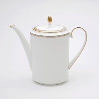 Rings of gold adorn fine white bone china with the lustrous shine of a wedding band. White bone china features two different border trims of gold, a wide corded border of textured grosgrain ribbon on some pieces, a narrow edge on others. Rings of gold adorn fine white bone china with the lustrous shine of a wedding band. White bone china features two different border trims of gold, a wide corded border of textured grosgrain ribbon on some pieces, a narrow edge on others.