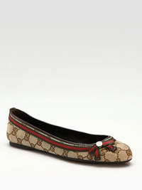The original GG fabric with web bow and interlocking metal G detail.Metal G ornament Leather trim Leather lining Padded insole Rubber sole ImportedOUR FIT MODEL RECOMMENDS ordering true size. The original GG fabric with web bow and interlocking metal G detail.Metal G ornament Leather trim Leather lining Padded insole Rubber sole ImportedOUR FIT MODEL RECOMMENDS ordering true size.