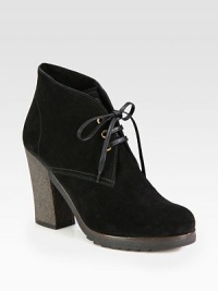 Suede platform lace-up with crepe sole. Rubber heel, 4 (100mm)Wooden platform, ½ (15mm)Compares to a 3½ heel (90mm)Suede upperLeather liningRubber trek solePadded insoleImported Suede platform lace-up with crepe sole. Rubber heel, 4 (100mm)Wooden platform, ½ (15mm)Compares to a 3½ heel (90mm)Suede upperLeather liningRubber trek solePadded insoleImported