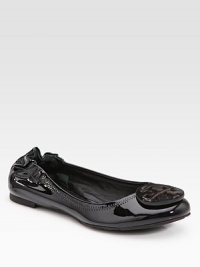 A modern classic in shiny patent leather with logo detail, tonal stitching and a comfortable elasticized back. Front patent leather logo Elasticized back Leather lining Padded insole Rubber sole ImportedOUR FIT MODEL RECOMMENDS ordering true size.. A modern classic in shiny patent leather with logo detail, tonal stitching and a comfortable elasticized back. Front patent leather logo Elasticized back Leather lining Padded insole Rubber sole ImportedOUR FIT MODEL RECOMMENDS ordering true size..