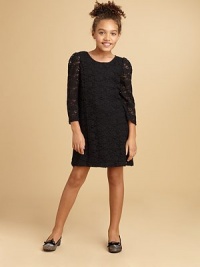 A stunning lace overlay lends a gorgeous touch to a simply irresistible shift dress.ScoopneckLong sleevesBack zipperPolyesterDry cleanImported A stunning lace overlay lends a gorgeous touch to a simply irresistible shift dress.ScoopneckLong sleevesBack zipperPolyesterDry cleanImported