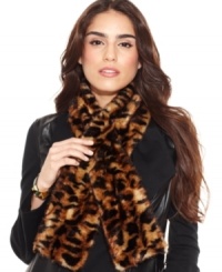 Feel fabulously fierce in this leopard print faux fur scarf from Calvin Klein. The convenient pull through design keeps you cozy even on the coldest days. Feel fabulously fierce in this leopard print faux fur scarf from Calvin Klein. The convenient pull through design keeps you cozy even on the coldest days.