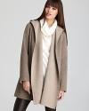 Flawlessly structured in a rich wool blend, this hooded Vince sweater is sure to be your winter-wardrobe staple.