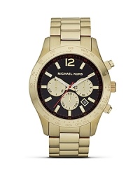 High impact accessories are on our radar. Perfect the look with this over sized gold watch from MICHAEL Michael Kors, featuring chronograph movement and a superfine sun-ray dial.
