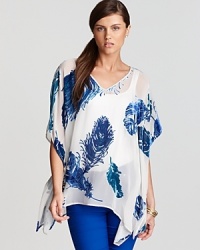 Infuse your look with bohemian elegance in this sheer Karen Kane blouse, peppered with velvet feathers for a soaring style statement. Infuse your look with bohemian elegance in this sheer Karen Kane blouse, peppered with velvet feathers for a soaring style statement.