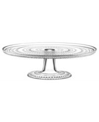 Like dewdrops in the morning sun, the bubbles circling iittala's Kastehelmi cake stand glisten in pressed glass to reflect all the light at your table. A vintage Oiva Toikka design. Like dewdrops in the morning sun, the bubbles circling iittala's Kastehelmi cake stand glisten in pressed glass to reflect all the light at your table. A vintage Oiva Toikka design.
