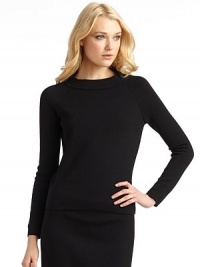 THE LOOKA smooth, simple knit with an elegant attitudeWide foldover collarLong raglan sleevesTHE FITAbout 22½ from shoulder to hemTHE MATERIALWoolCARE & ORIGINHand washImportedModel shown is 5'9½ (176cm) wearing US size Small. THE LOOKA smooth, simple knit with an elegant attitudeWide foldover collarLong raglan sleevesTHE FITAbout 22½ from shoulder to hemTHE MATERIALWoolCARE & ORIGINHand washImportedModel shown is 5'9½ (176cm) wearing US size Small.