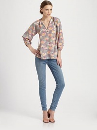 Muted florals highlight this effortless silk top styled with a chic tie-neckline.Tie split v-neckDropped shouldersGathered sleevesSet-in waistStraight hemAbout 26 from shoulder to hemSilkDry cleanImportedModel shown is 5'9½ (176cm) wearing US size Small. Muted florals highlight this effortless silk top styled with a chic tie-neckline.Tie split v-neckDropped shouldersGathered sleevesSet-in waistStraight hemAbout 26 from shoulder to hemSilkDry cleanImportedModel shown is 5'9½ (176cm) wearing US size Small.