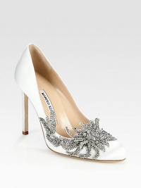 Sparkling vintage-inspired beads form a flower-like adornment on the side of this party-perfect satin pump. Self-covered heel, 4 (100mm)Beaded satin upperLeather lining and solePadded insoleMade in ItalyOUR FIT MODEL RECOMMENDS ordering one half size up as this style runs small. Sparkling vintage-inspired beads form a flower-like adornment on the side of this party-perfect satin pump. Self-covered heel, 4 (100mm)Beaded satin upperLeather lining and solePadded insoleMade in ItalyOUR FIT MODEL RECOMMENDS ordering one half size up as this style runs small.