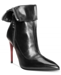 The epitome of sexy. The Tenn high heel booties by DMSX Donald J Pliner feature an exposed outside zipper with overlapping strap detail. The epitome of sexy. The Tenn high heel booties by DMSX Donald J Pliner feature an exposed outside zipper with overlapping strap detail.