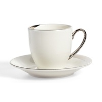 This demitasse cup & saucer glows with a hand-painted bright platinum design to create a contemporary classic on your table that will complement your dining experience throughout a lifetime of shifting trends and evolving fashions. This demitasse cup & saucer glows with a hand-painted bright platinum design to create a contemporary classic on your table that will complement your dining experience throughout a lifetime of shifting trends and evolving fashions.