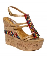 Sweeten up your summer with the Bead It sandals by Two Lips. The candy necklace-inspired beads put a playful spin on the sandal's ultra-chunky wedge silhouette. Sweeten up your summer with the Bead It sandals by Two Lips. The candy necklace-inspired beads put a playful spin on the sandal's ultra-chunky wedge silhouette.